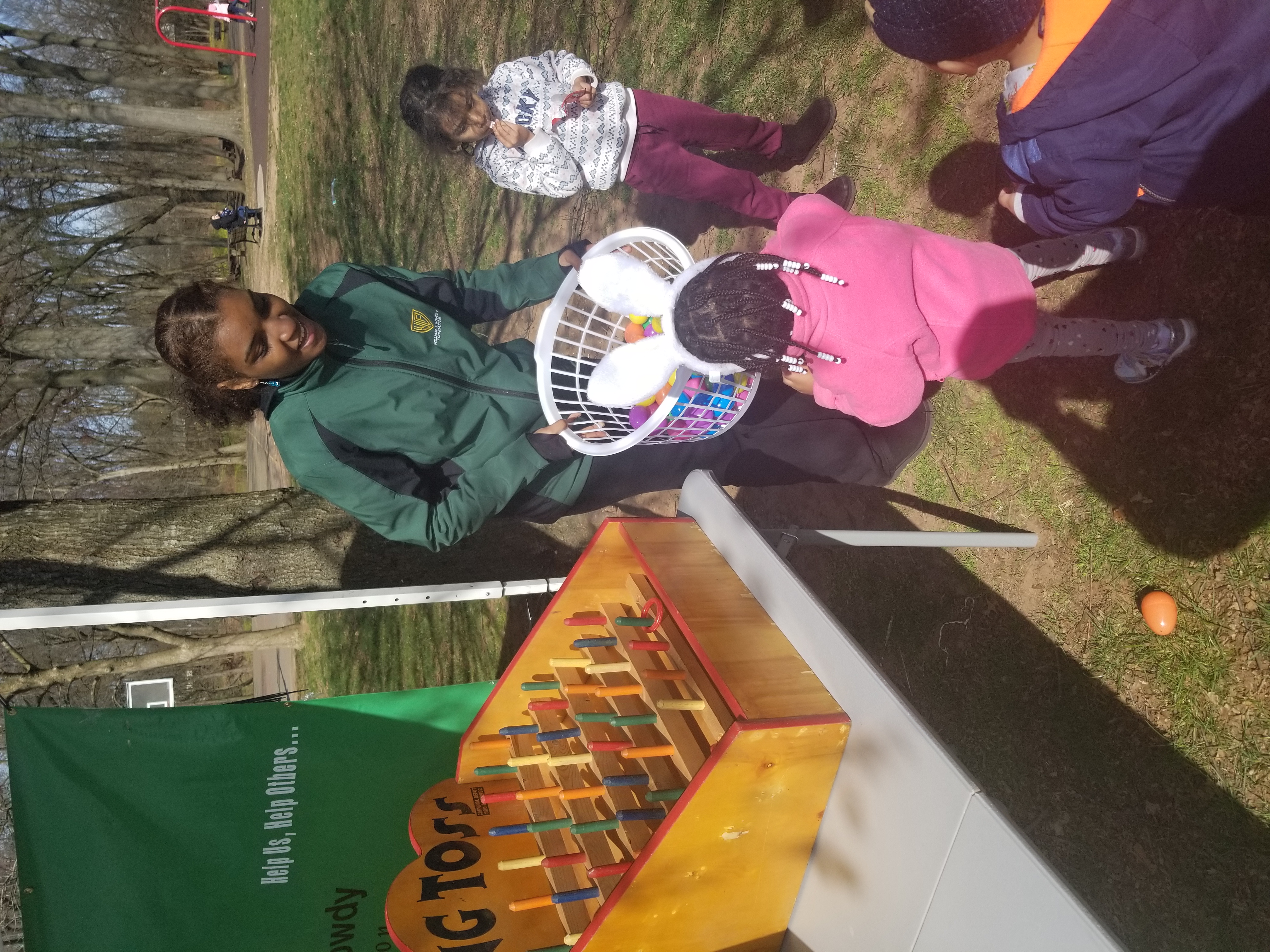 Families at a foundation Easter egg hunt